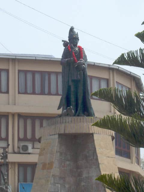 Across from the polling station in Jawalakhel, royalist supporters put a fresh flower garland on the statue of King Birendra, assassinated in 2001.
