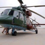 A new Russian made MI17 helicopter sits on Camp Taji while Iraqi Air Force