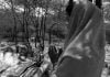 A Pakistani Hindu Refugee Woman Praying Outside Her Tent