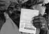 Pakistani Hindu Refugee Man Shows His Pakistani Passport