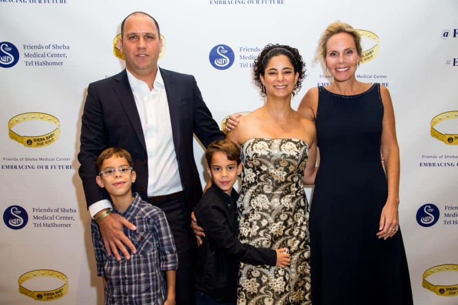 L-Dvir &amp; Orly Salomon, Dr. Tzipi Strauss, Salomon Children-Yuval [L] and Guy Salomon. Yuval's life was saved at Sheba Neonatal unit