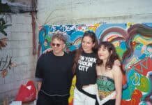 Isabella Mancin on: Creative Philosophy, Intentional Design, and the Poetics of Experience People posing in front of a colorful wall