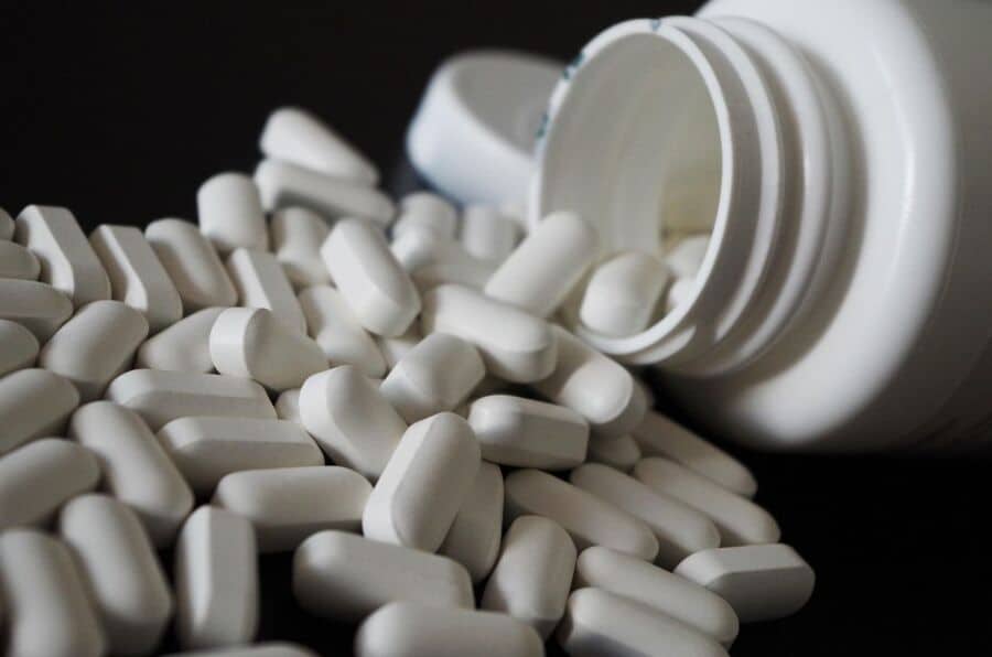 bottle of white pills