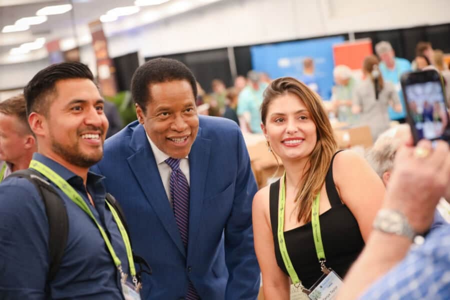 FreedomFest Leaders Defend Liberty, Free Markets, Open Debate 1 Larry Elder poses with two attendees at FreedomFest. Photo c/o FreedomFest.