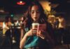 How Texting Puts Society’s Communication Skills in Peril Woman looking at smartphone instead of talking communication. Image by Kirill Averianov from Pixabay