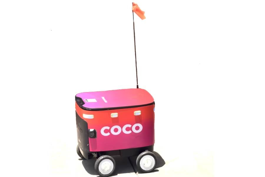 globotics: Coco autonomous delivery robot on a city sidewalk as robots move into everyday urban life