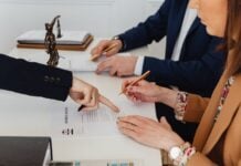 Preparing for Divorce: Important Steps Before Filing Photo by www.kaboompics.com: https://www.pexels.com/photo/woman-signing-a-decree-7876038/