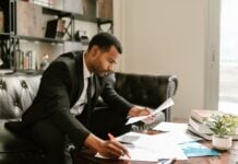 The Financial Impact of Serious Accident Injuries Photo by RDNE Stock project: https://www.pexels.com/photo/a-man-in-a-suit-looking-at-documents-on-a-coffee-table-7821545/