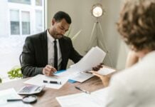 How Immigration Laws Impact Long-Term Residency Goals Photo by RDNE Stock project: https://www.pexels.com/photo/professional-man-looking-at-papers-7821680/