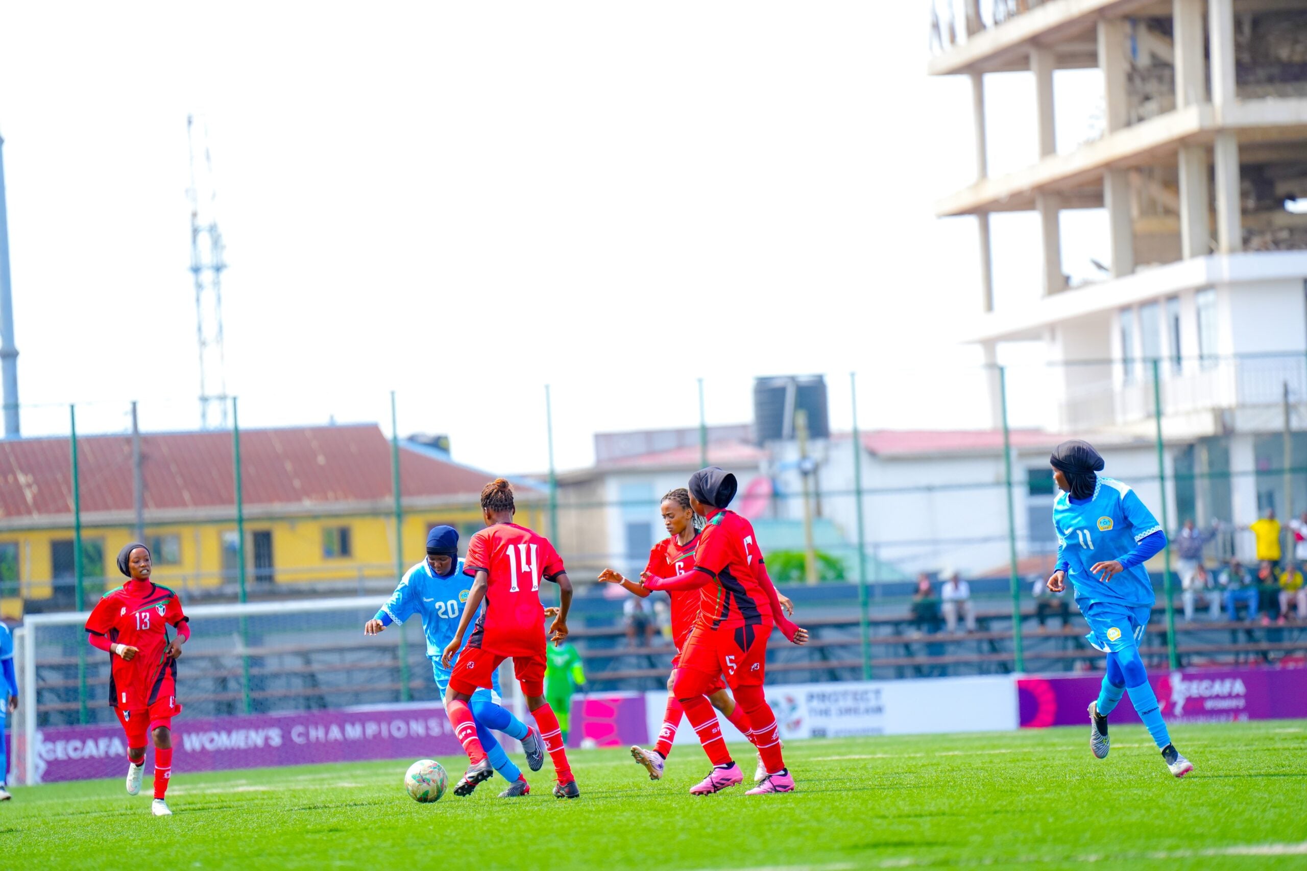 Somalia and Sudan players contest the ball during the CECAFA Women’s U-17 Championship in Dar es Salaam.