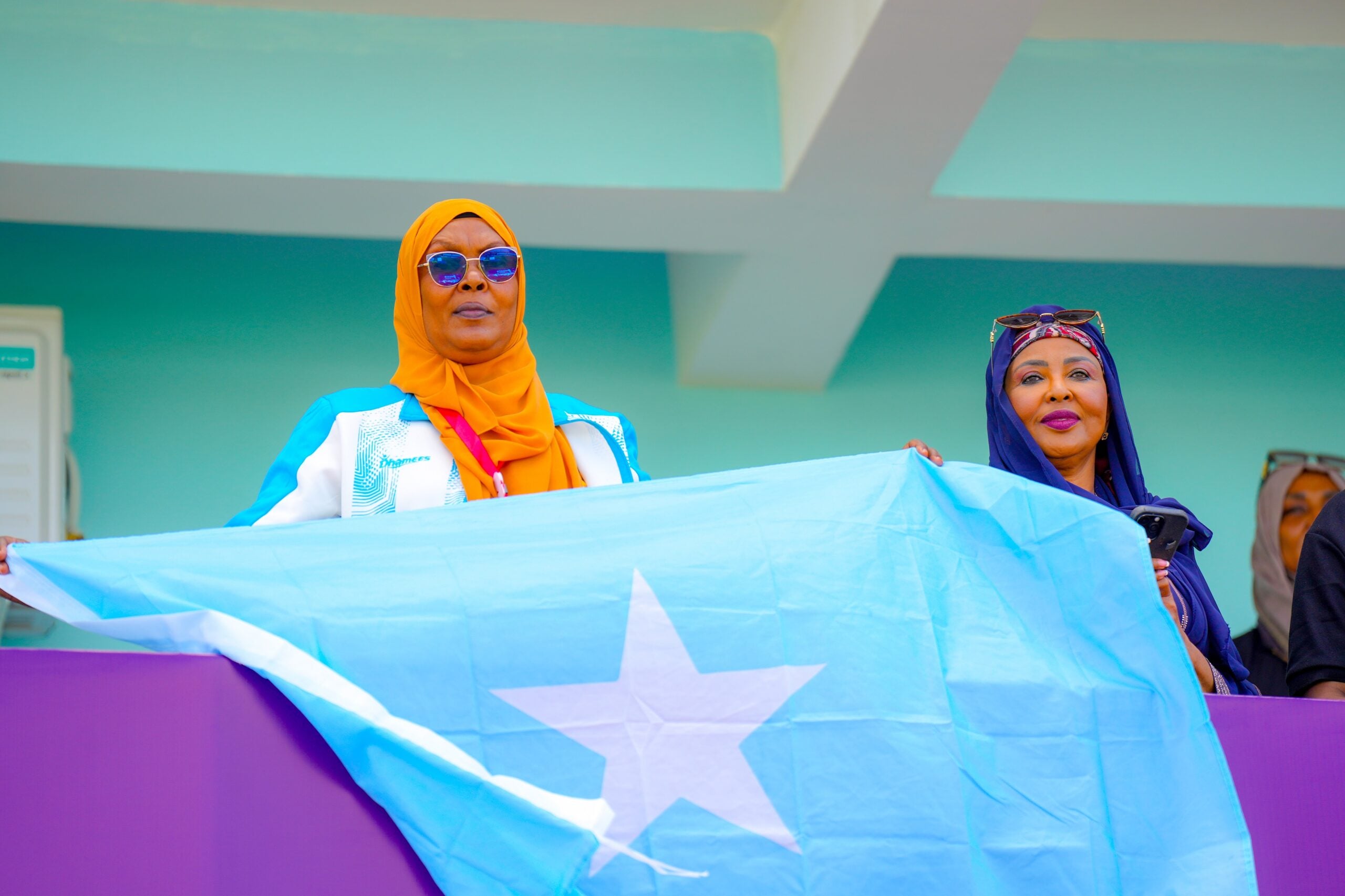 Supporters hold a Somali flag during the CECAFA Women’s U-17 Championship.