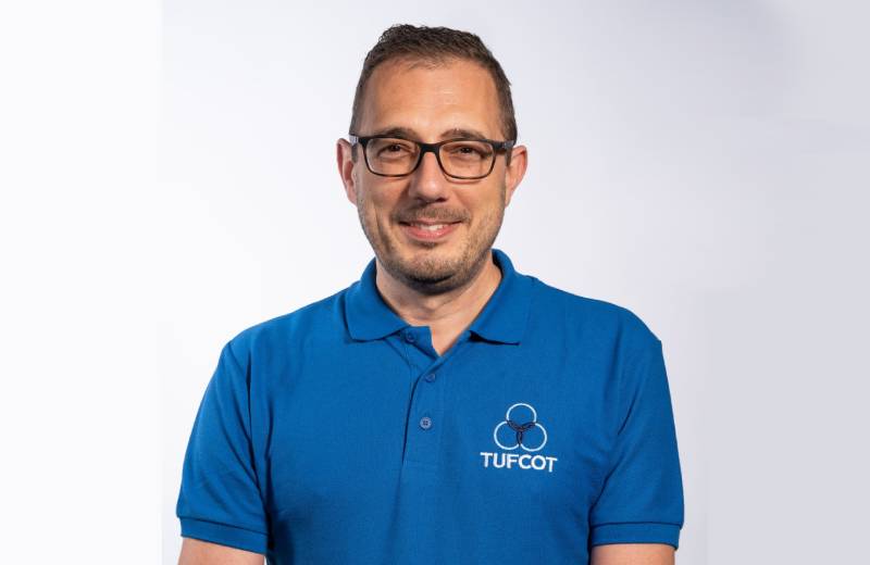 Carl Buddery, CEO of Tufcot Engineering Ltd, wearing a blue Tufcot shirt
