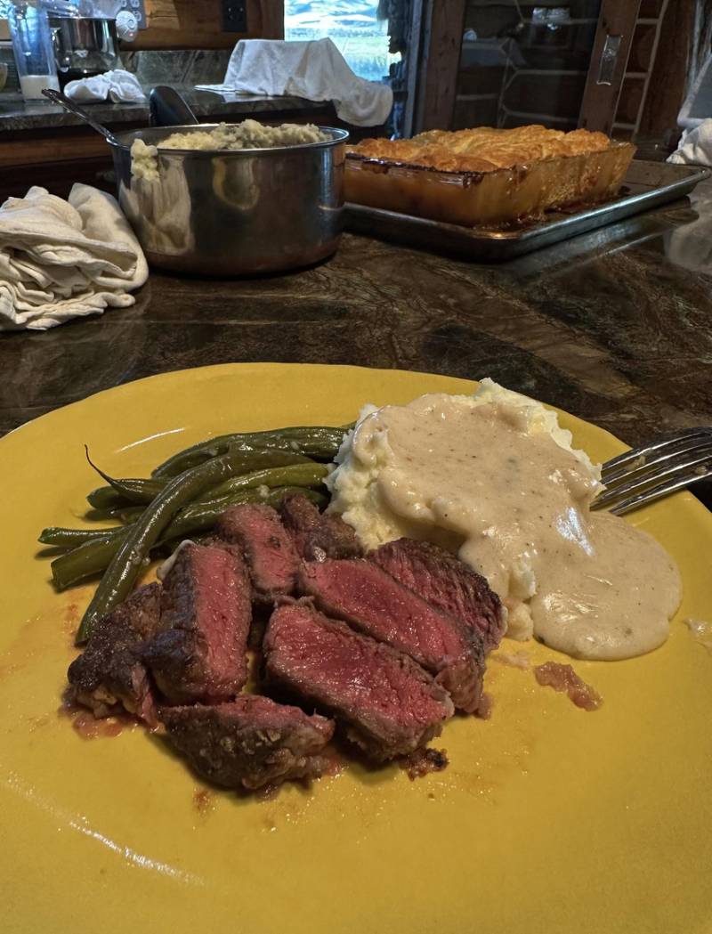 The payoff. Steak, mashed potatoes, green beans. Most Montana freezers read like a season-by-season record of the past year.