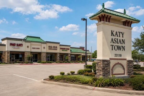 Texas Lawsuit Alleges Fraud Against Prominent Realtor Involving Katy Asian Town Development 1 AI-generated illustration of a Katy Asian Town-style shopping center sign and storefronts.