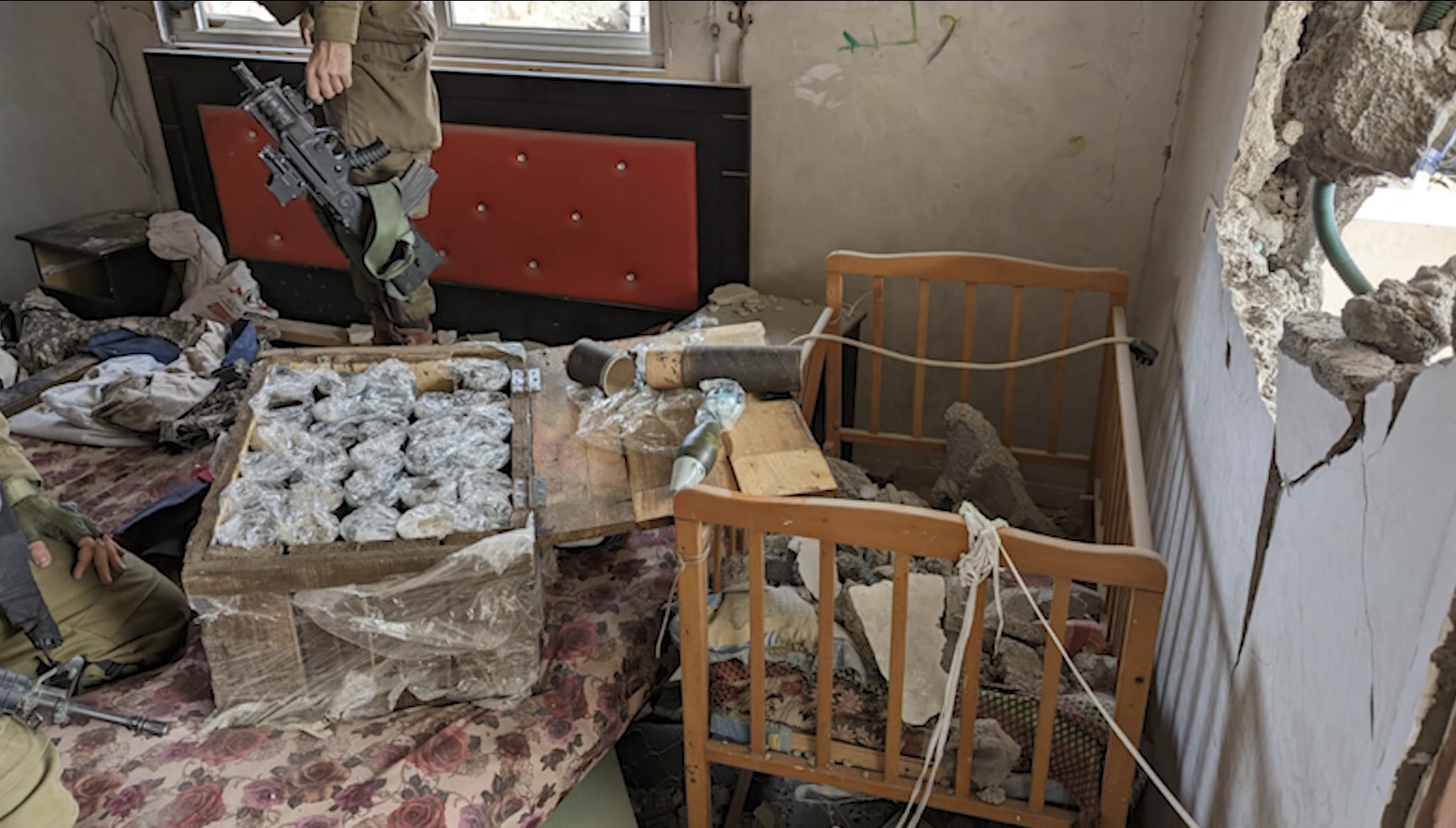 The Real Gaza – Not NAZA - Story 2 Weapons and military equipment shown inside a Gaza home.